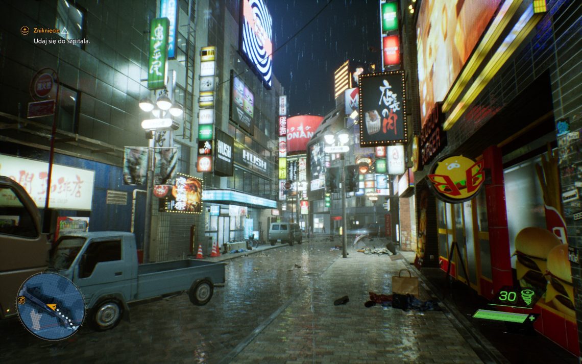 Zdjęcie japońskiego miasta, które zostało uchwycone nocą w grze GhostWire: Tokyo.