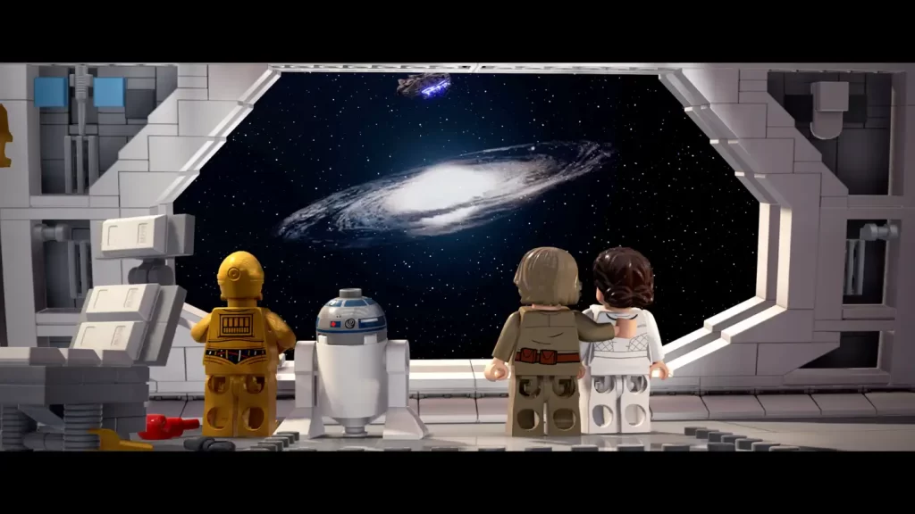 LEGO Star Wars: The Skywalker Saga — screen z gry. Leia, Luke, R2D2 oraz C3PO spoglądają w gwiazdy przez szybę na statku kosmicznym. 