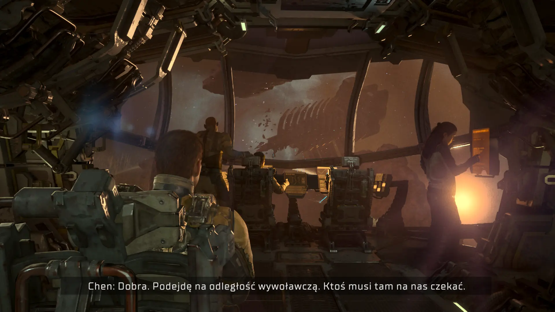 Dead Space. Chłop patrzy jak załoga wykonuje całą robotę.