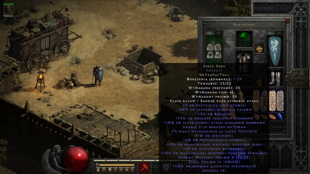 Ekran ekwipunku w grze Diablo II Resurrected pokazujący szczegółowe statystyki magicznej broni 'Heart of the Oak'. Widoczne są różne sloty na przedmioty, w tym hełm, zbroja i tarcza, oraz opis broni z licznymi bonusami, takimi jak zwiększone obrażenia przeciwko demonom i szybsze rzucanie zaklęć.