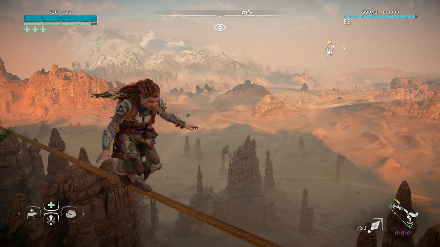 Alony balansująca na linie z rozległym pustynnym krajobrazem w tle.