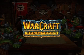 Grafika pod recenzję Warcraft I: Remastered - logo gry z orkami w tle.