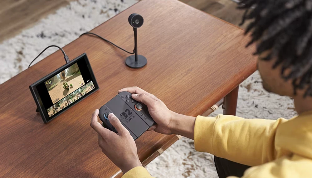 Chłopak grający na Nintendo Switch 2