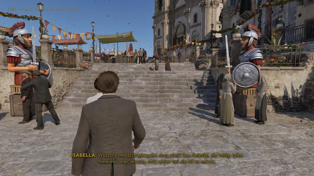 Enzo wraz z Isabellą idą do kościoła i mijają posągi rzymian