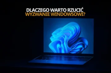 laptop w ciemności z błękitną tapetą, z napisem "Dlaczego warto rzucić wyzwanie Windowsowi?"