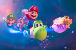 Mario, Luigi, Peach i Yoshi lecący przez kosmiczny świat w The Super Mario Galaxy Movie