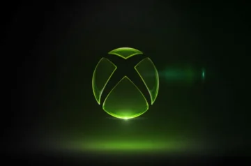 Świecące zielone logo Xbox na czarnym tle. Występuje w usłudze Game Pass