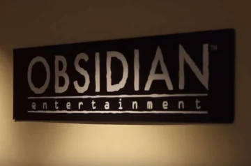 Logo Obsidian Entertainment na ścianie - grafika pod wpis dot. pozwu