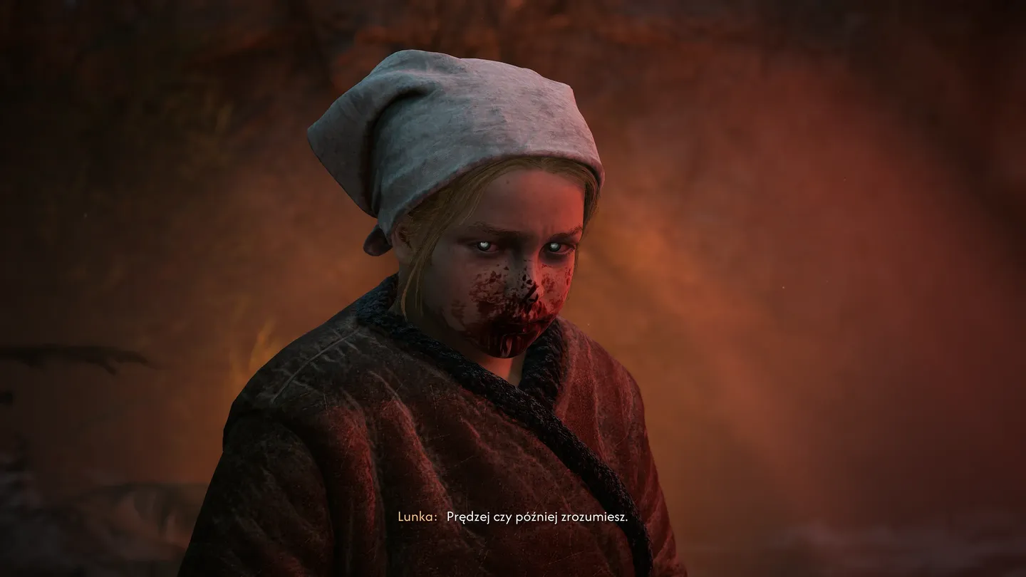 Zbliżenie na Lunkę w grze The Blood of Dawnwalker, z zakrwawioną twarzą i białą chustą na głowie, podczas dialogu.