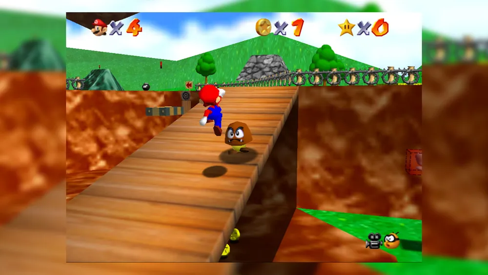 Główny bohater Super Mario 64 skaczący na goombe w pierwszym poziomie gry
